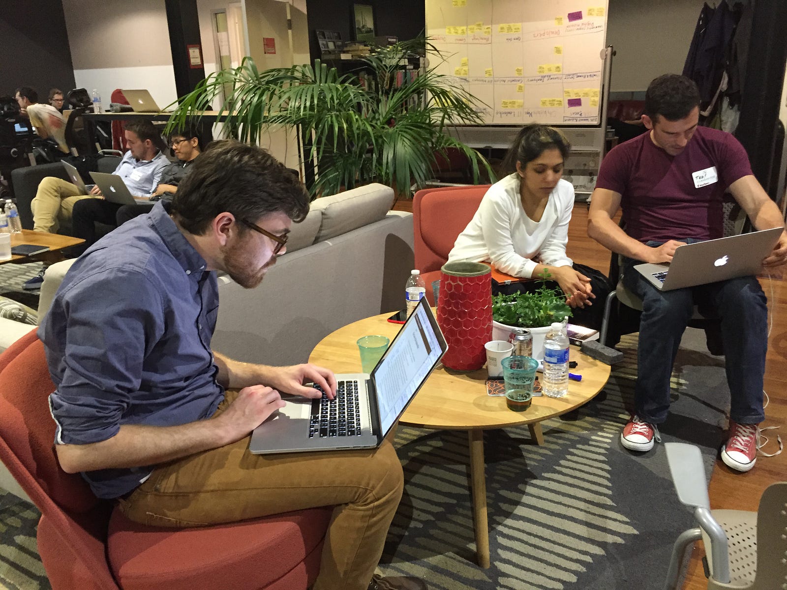 Builders collaborating at a hackathon